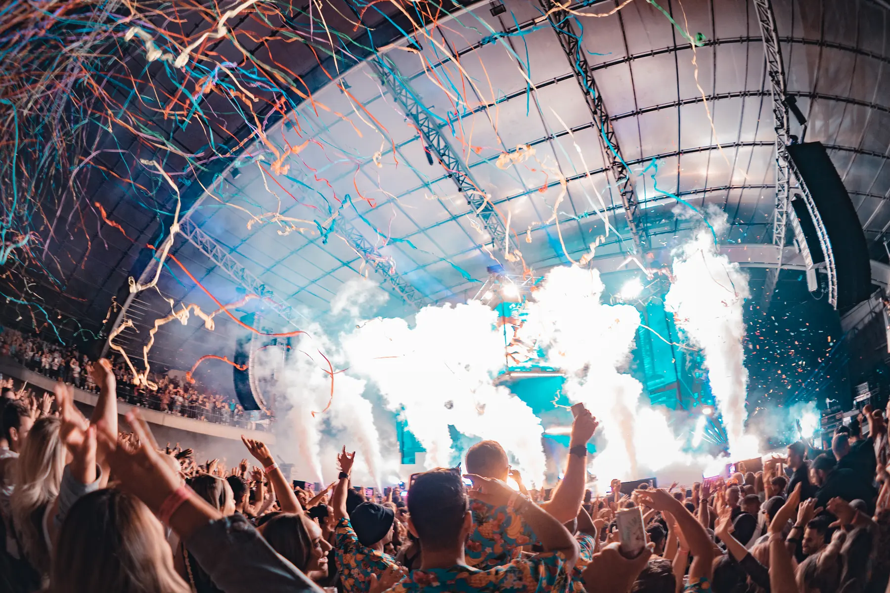 Streamers and smoke cannons firing over the Reminisce crowd